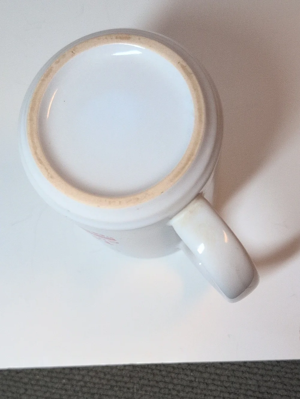 Roger's Tattle Tale White Ceramic Mug with Red Logo